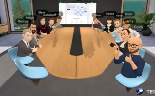 Screenshot of a virtual reality meeting held by Tern. Avatars sit around a virtual conference table with their thumbs up.